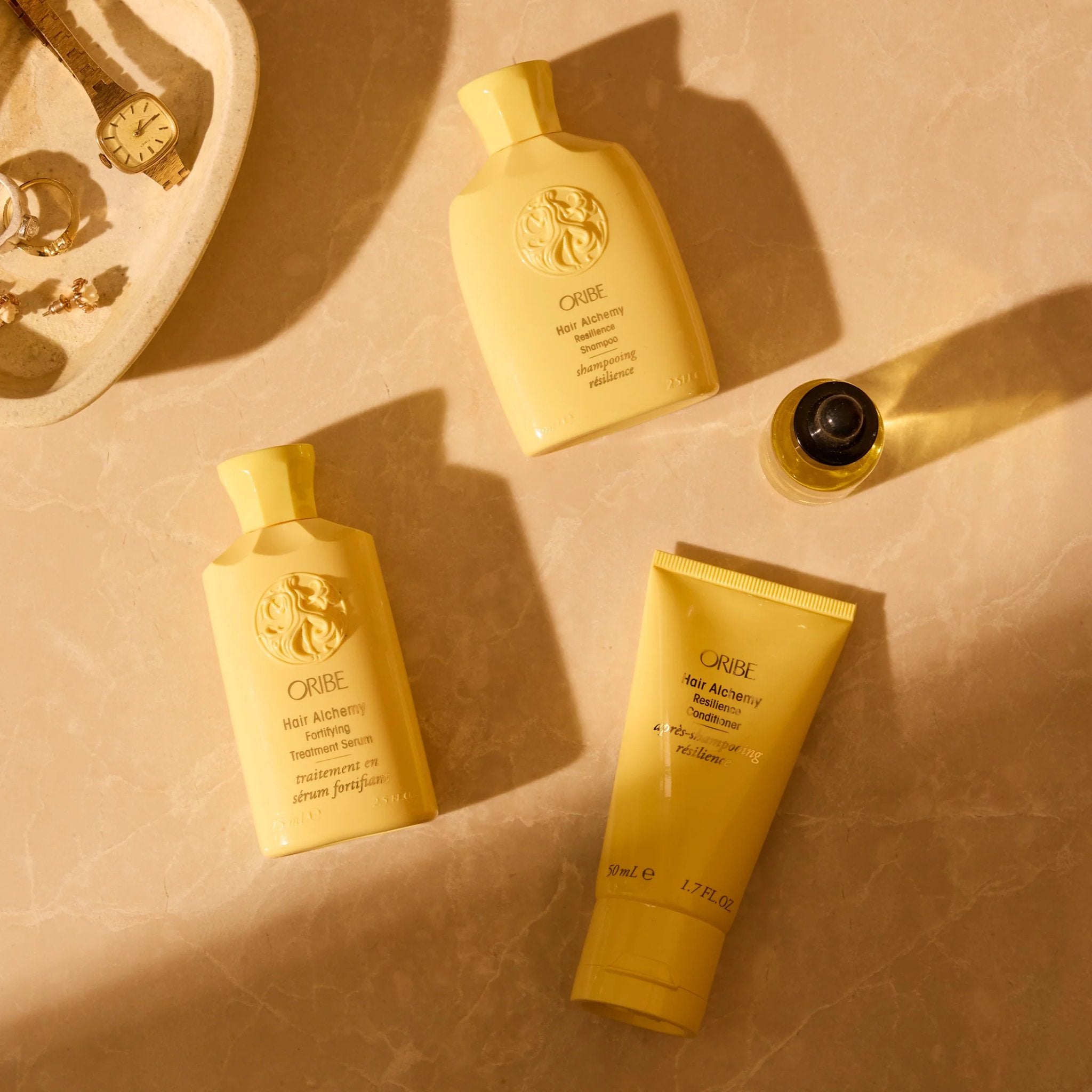 Oribe. Sérum Traitant Fortifiant Hair Alchemy - 75 ml - Concept C. Shop