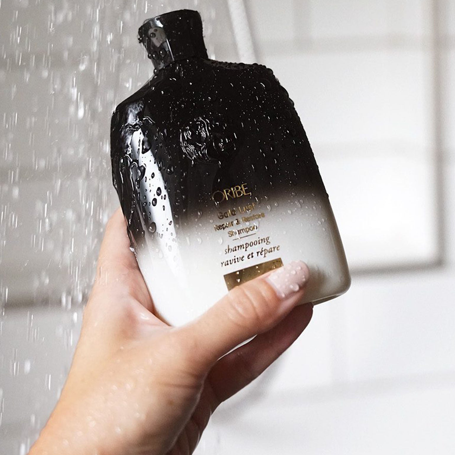 Oribe. Shampoing Ravive et Répare Gold Lust - 1000 ml - Concept C. Shop